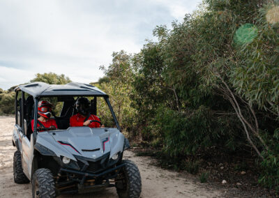 Passenger riding with guide on Kangaroo Island Outdoor Action guided quad bike tour