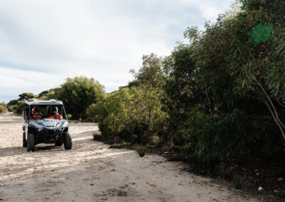 Passenger riding with guide on Kangaroo Island Outdoor Action guided quad bike tour